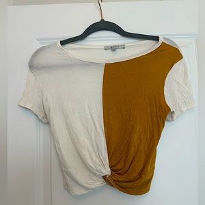 VERY gently worn short sleeved cropped shirt. Mustard color and white
